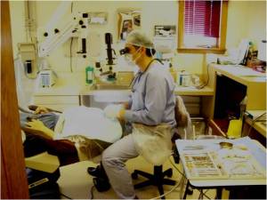 Periodontist Dr. Robert Alvarenga in oral surgery with patient in West Lebanon NH